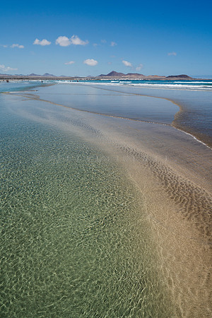 Arena entre aguas - Playa de Famara, Teguise.