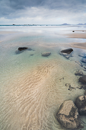 Entre agua y aire - Un día nublado en la Playa de Famara, Tegui